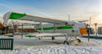 Plane covered in snow